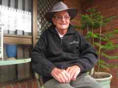 Cyril sitting on a bench