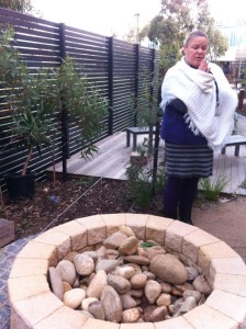 Mel Edwards in front of the well