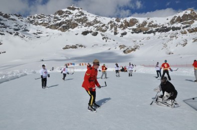 RCMP mountie playing hockey in the mountains