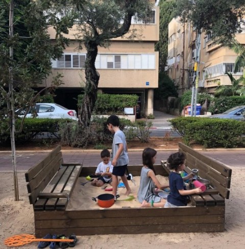 Movable sandbox outside community centre. Photo: Bosmat Sfadia Wolf.